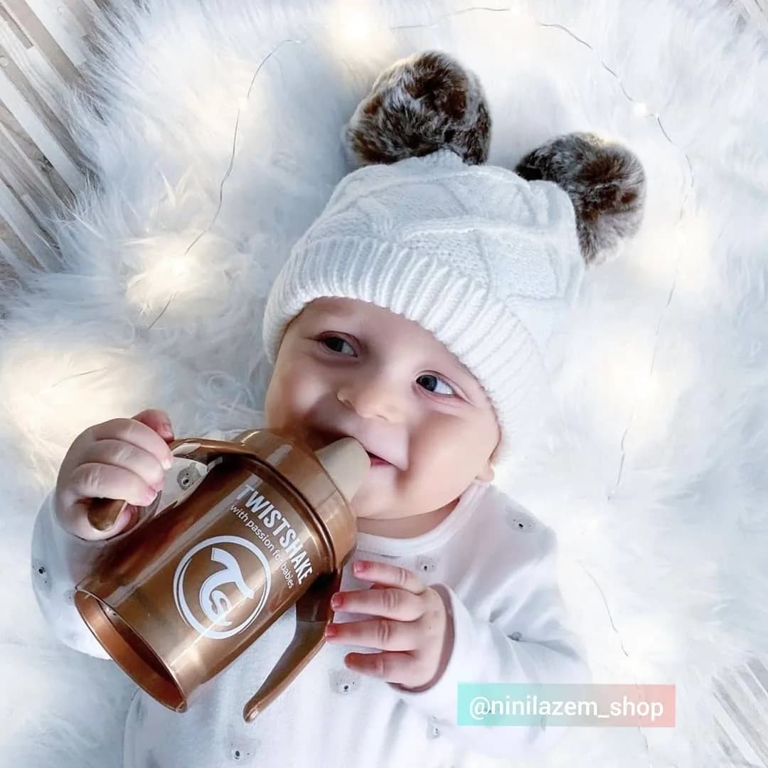 شیشه شیر آموزشی تویست شیک، رنگ برنزی و طلایی، جنس پلاستیک، بطری دسته‌دار
