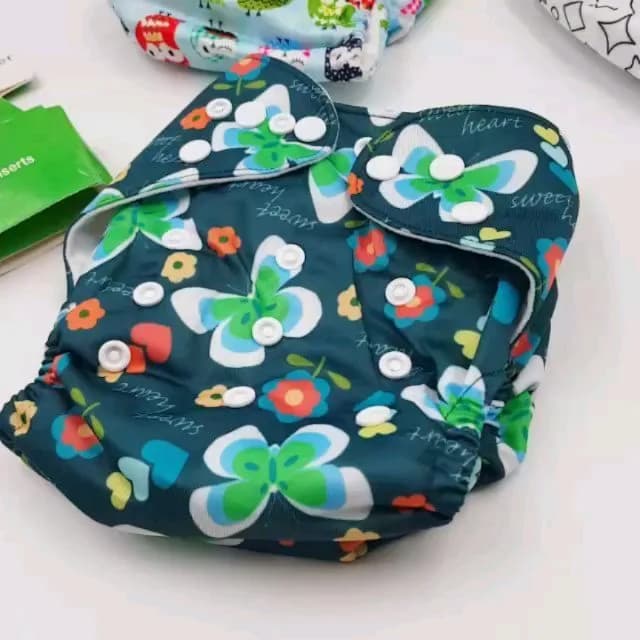 شورت آموزشی کودک baby vision، رنگ بنفش، جنس پارچه، طرح گلدار، کمر کش، دکمهدار