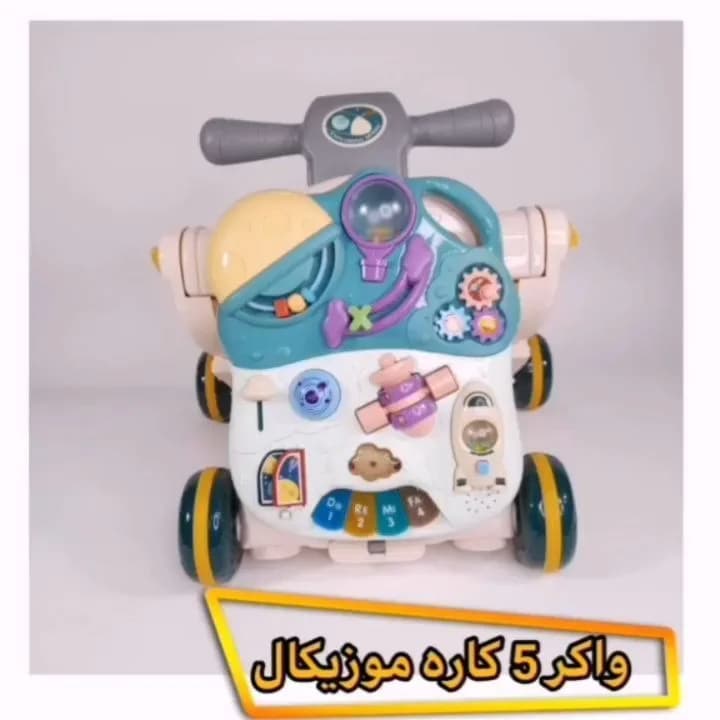 واکر ۵ کاره موزیکال، رنگ سبز، سفید و زرد، جنس پلاستیک، چهارچرخ، دارای میز بازی