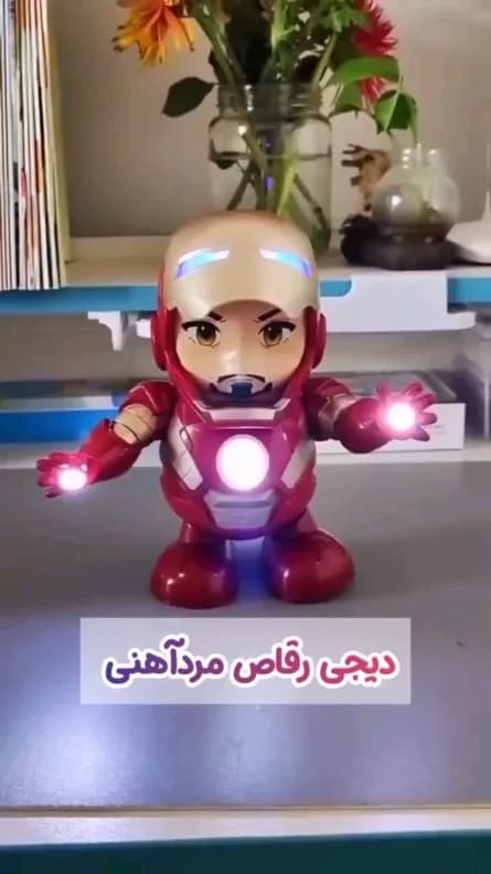 اسباب بازی دیجی رقاص مردآهنی، رنگ قرمز و طلایی، جنس پلاستیک، فیگور رقصان