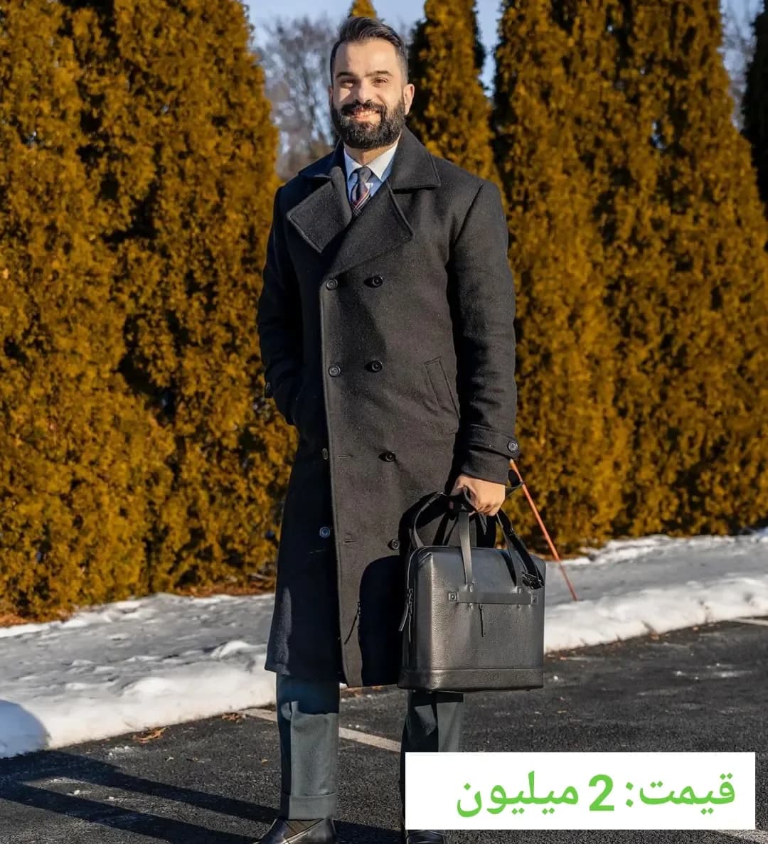 پالتو دبل برست بلند فوتر، رنگ مشکی، جنس چرم، یقه انگلیسی