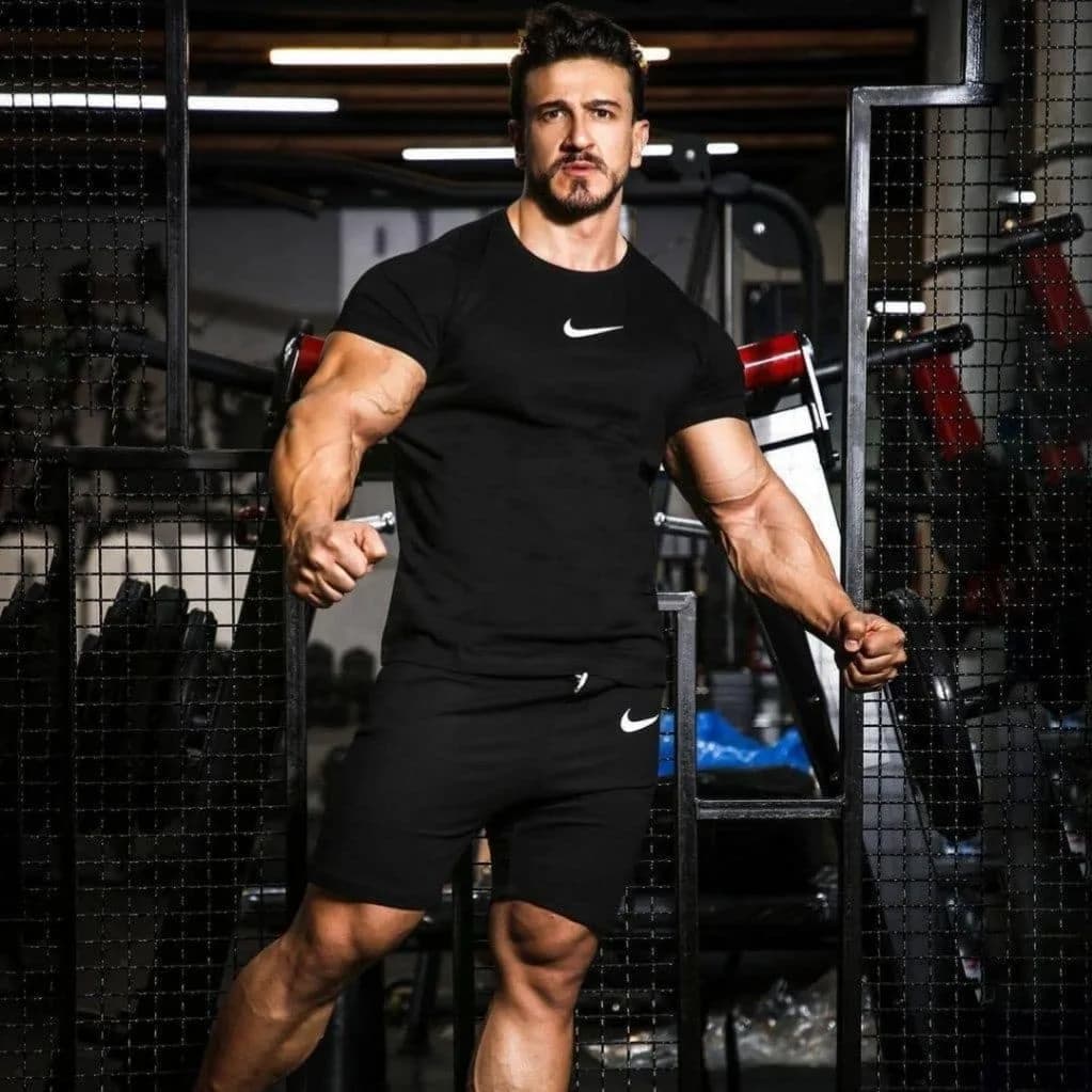 شلوارک ورزشی حرفهای Nike، رنگ مشکی، جنس پنبهای، تیشرت جذب با شلوارک
