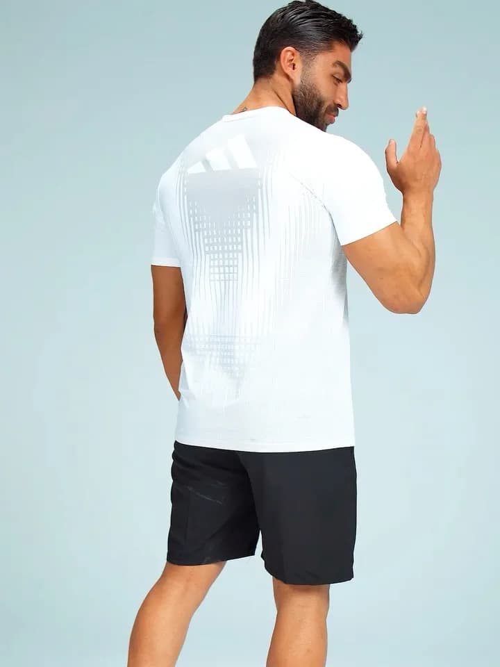 تیشرت ورزشی و شلوارک میکروآیس، رنگ سفید، آستین کوتاه، یقه گرد، جذب