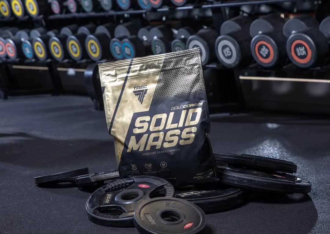 پودر گینر Solid Mass Trec، رنگ سیاه و طلایی، جنس پلاستیک، کیسه پودر مکمل