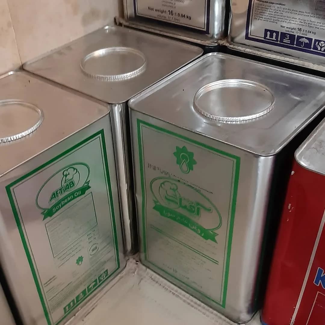 روغن مایع پخت و پز آفتاب، رنگ نقره‌ای و سبز، جنس فلز، حلب مستطیلی