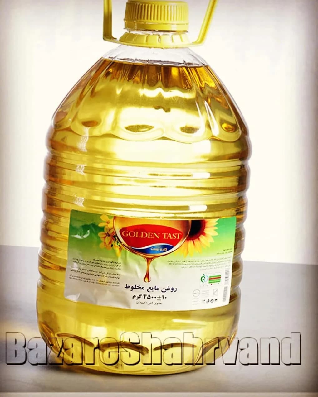 روغن مایع مخلوط ۵ لیتری گلدن تیست، رنگ زرد، جنس پلاستیک، دبه‌ی دسته‌دار