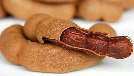 تمر هندی، رنگ قهوهای و قرمز، میوه استوایی، غلاف