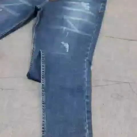 شلوار جین پارچه کجراه، رنگ آبی، جذب، پاره