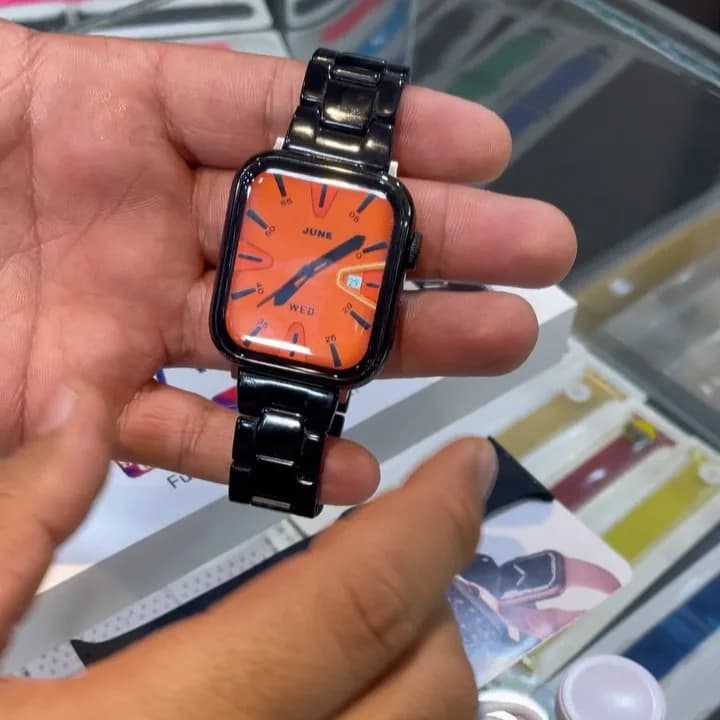 ساعت هوشمند x7max، رنگ مشکی و نارنجی، جنس فلز و شیشه، مربع، بند فلزی