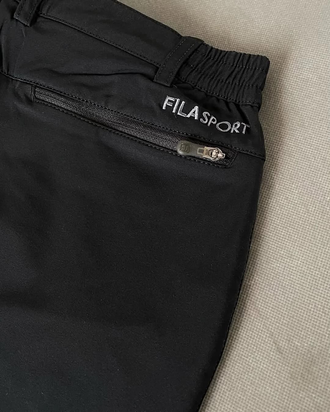 شلوار طبیعتگردی پاییزه زمستانه Fila، رنگ مشکی و نقرهای، راسته اسپرت