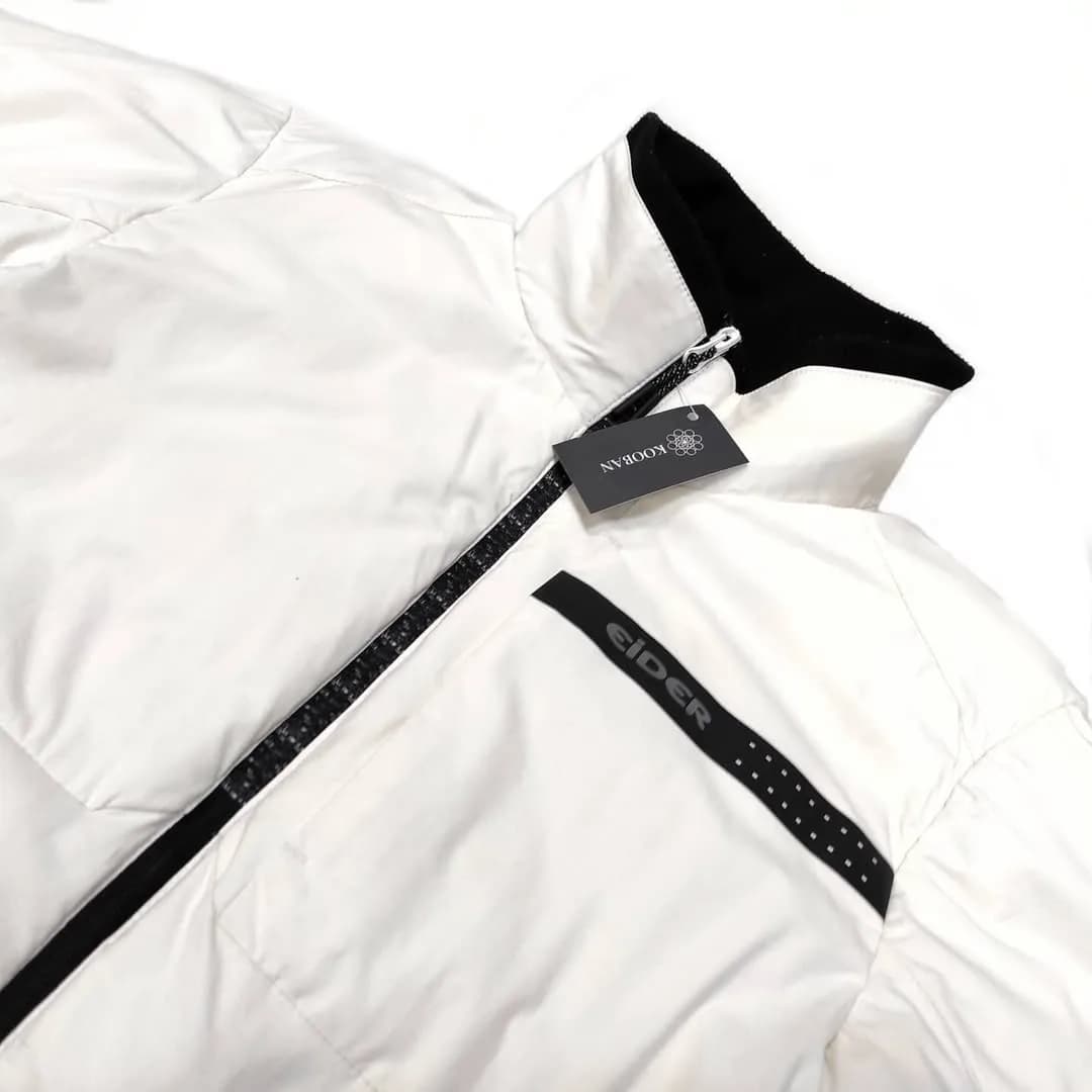 کاپشن سایز M EIDER، رنگ سفید و مشکی، یقه ایستاده، زیپدار