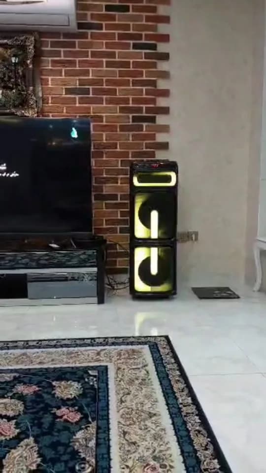 اسپیکر شارژی، رنگ مشکی و زرد، جنس پلاستیک، ایستاده، بزرگ