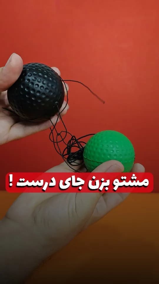 توپ هدبندی بوکس، رنگ مشکی و سبز، جنس پلاستیک، طرح خال‌دار، توپ با کش سر