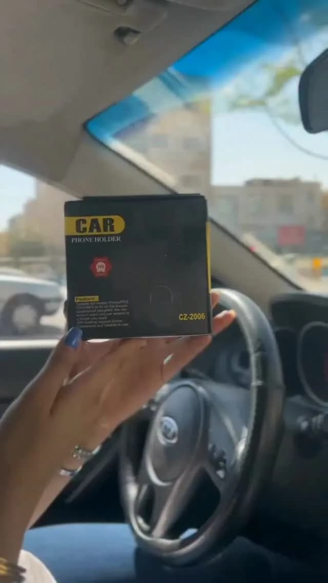 هولدر موبایل زیر آینه‌ای، رنگ مشکی و زرد، جنس مقوا، جعبه محصول