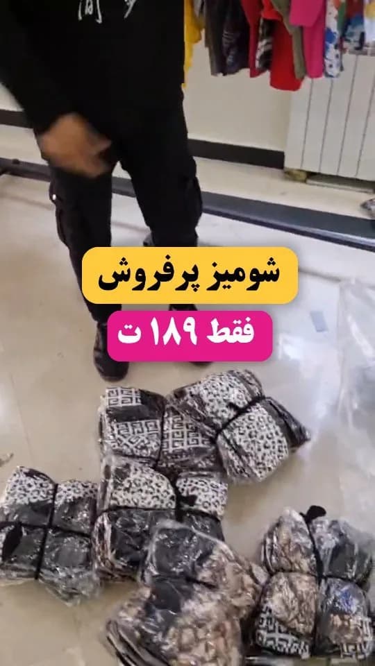 شومیز ترکیبی آستین گرهی، رنگ مشکی و سفید، جنس حریر، طرح پلنگی، کوتاه گشاد آستین بلند