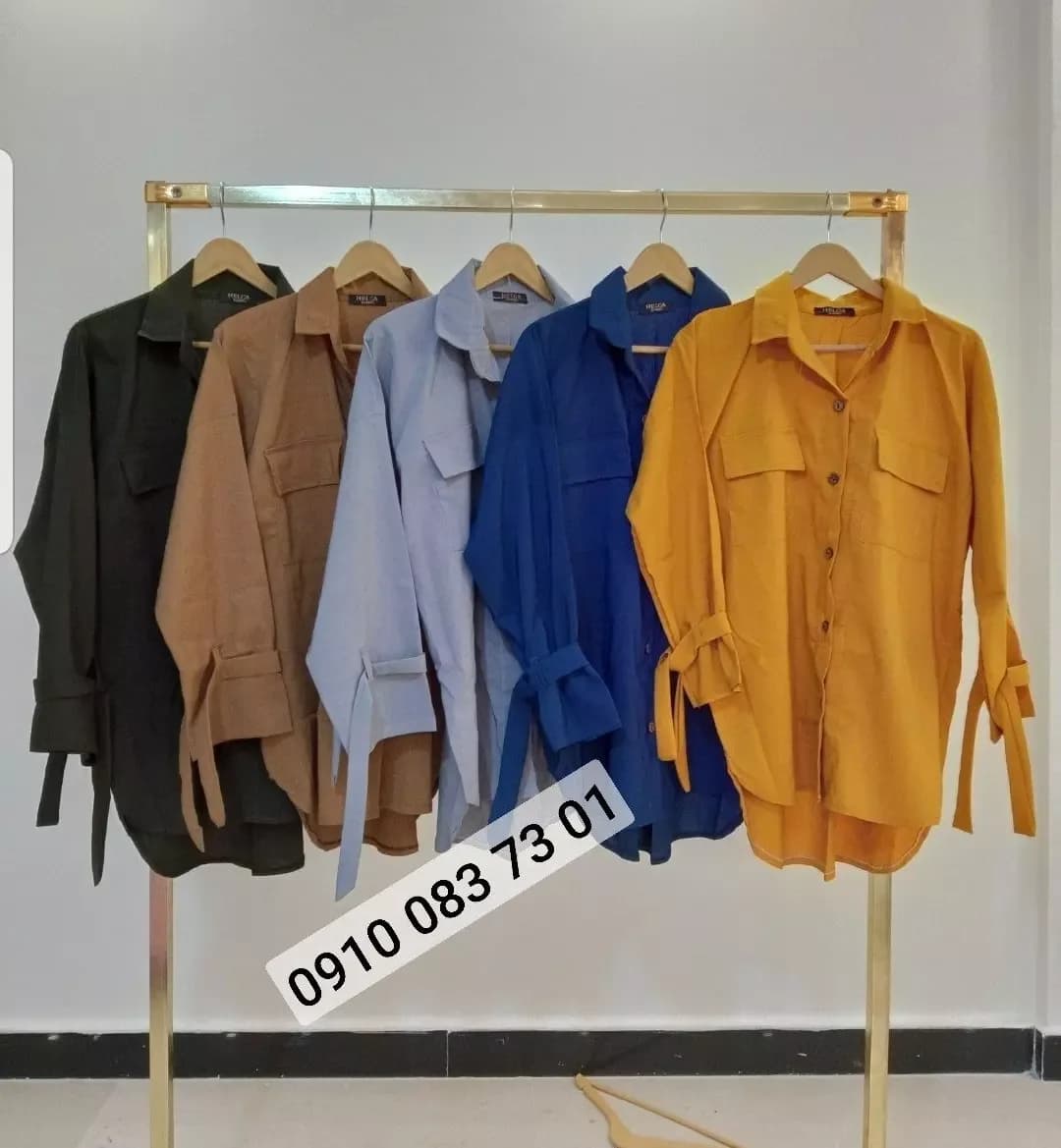 مانتو پیراهنی اسپرت دوجیب، رنگ زرد، سرمه‌ای، آبی روشن، قهوه‌ای و سبز تیره، جنس کتان، بلند گشاد آستین‌بلند