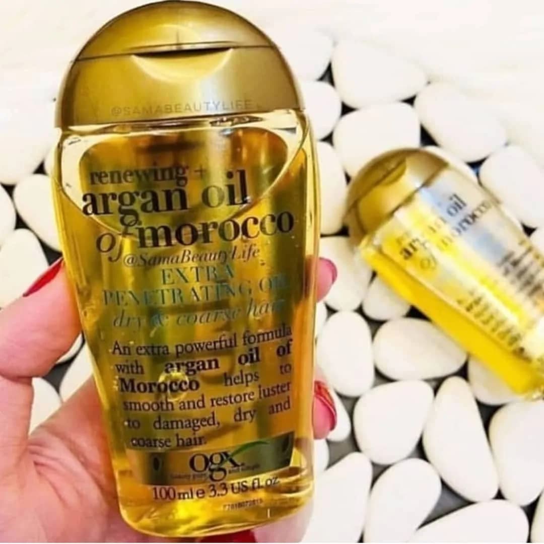 روغن آرگان مناسب انواع مو OGX، رنگ زرد و طلایی، جنس پلاستیک، بطریِ درپوشدار