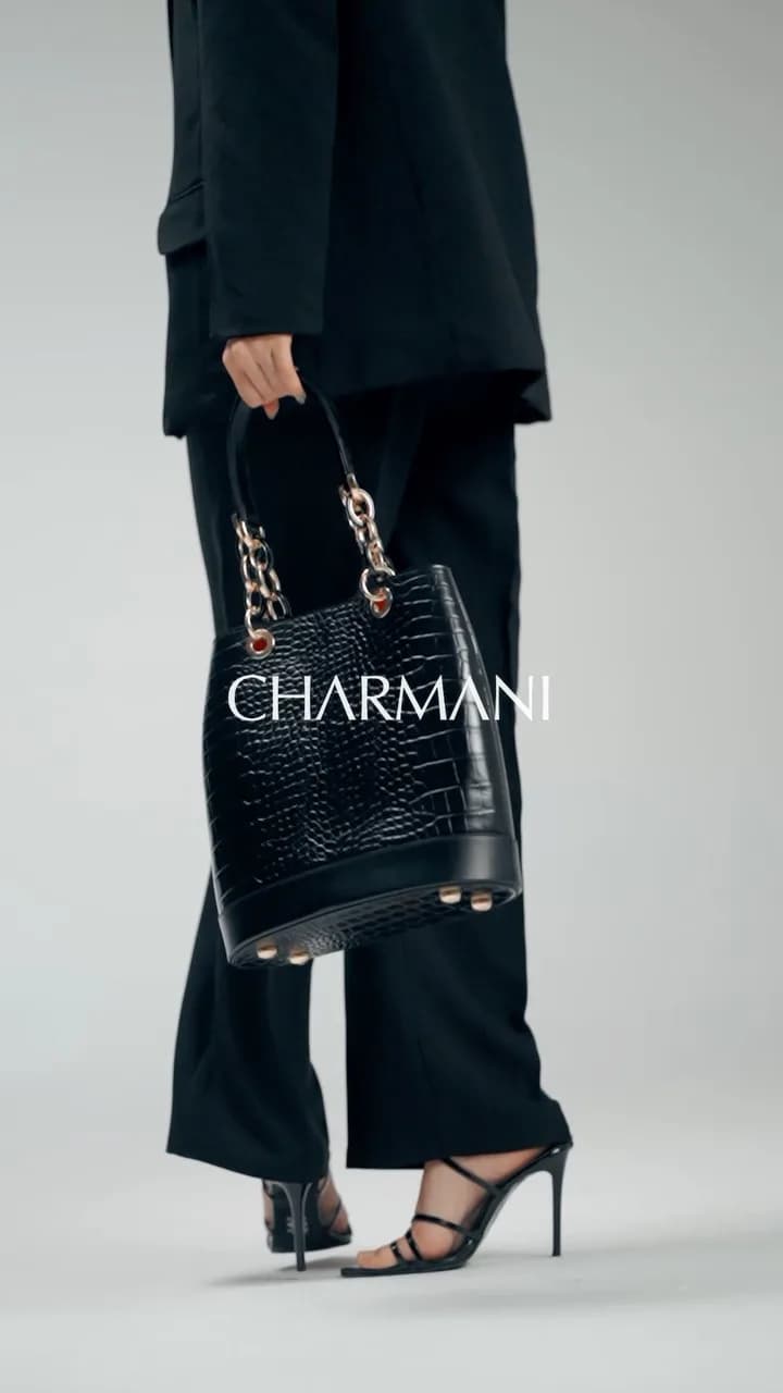 کیف چرم زنانه استایل ۱۲۱۴، رنگ مشکی، طرح طرح حیوانی، کیف دستی با بند زنجیری