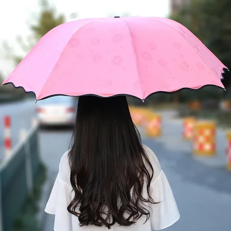 چتر تاشو جادویی زنانه هشت فنر تاپ، رنگ صورتی، جنس پارچه، طرح گلدار، تاشو و دستهدار