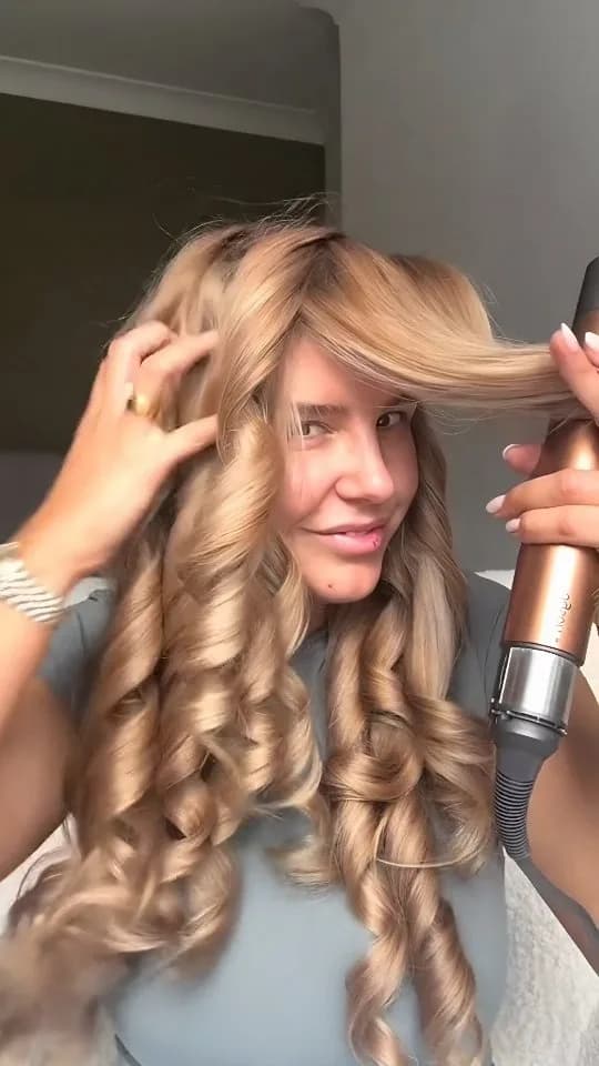 استایلر مو، رنگ مسی و مشکی، جنس پلاستیک و فلز، اتو مو، استوانهای