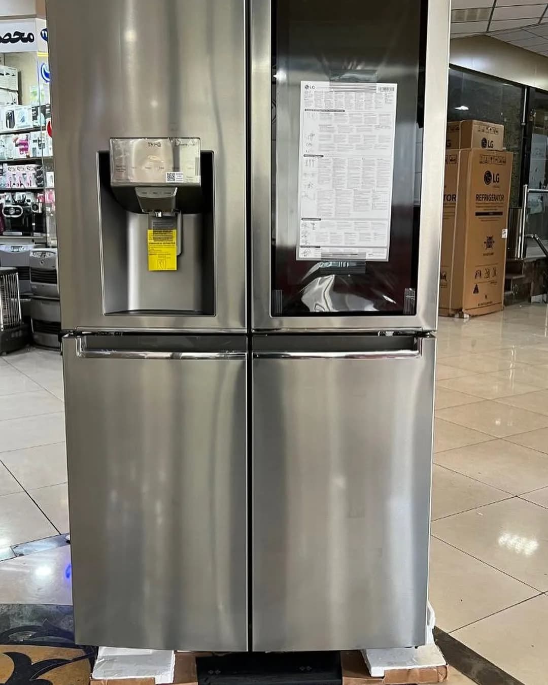 یخچال ساید بای ساید ۳۲ فوت مدل X945 الجی، رنگ نقرهای، جنس استیل و شیشه، چهار درب، اینستاویو