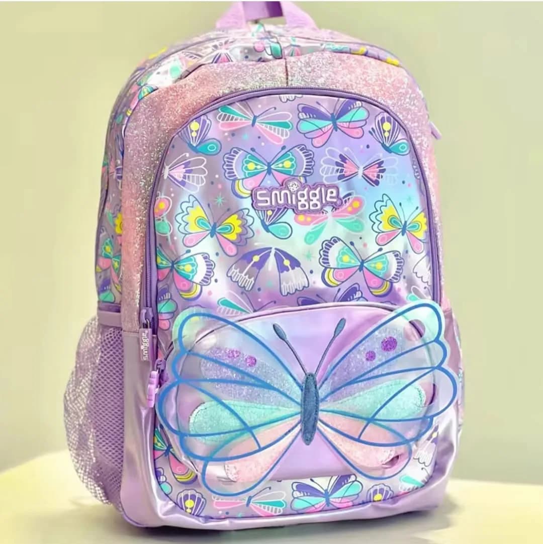 کوله پشتی اسمیگل Smiggle، رنگ بنفش، صورتی و آبی، طرح شخصیت کارتونی