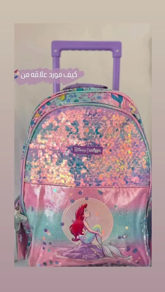 کوله پشتی چرخدار مدرسه، رنگ صورتی، بنفش و آبی، طرح شخصیت کارتونی