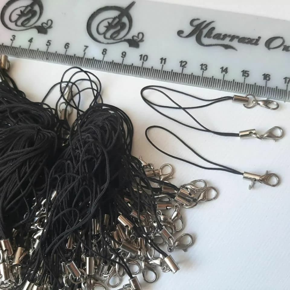 آویز موبایل قفلدار، رنگ مشکی و نقرهای، جنس پلاستیک و فلز