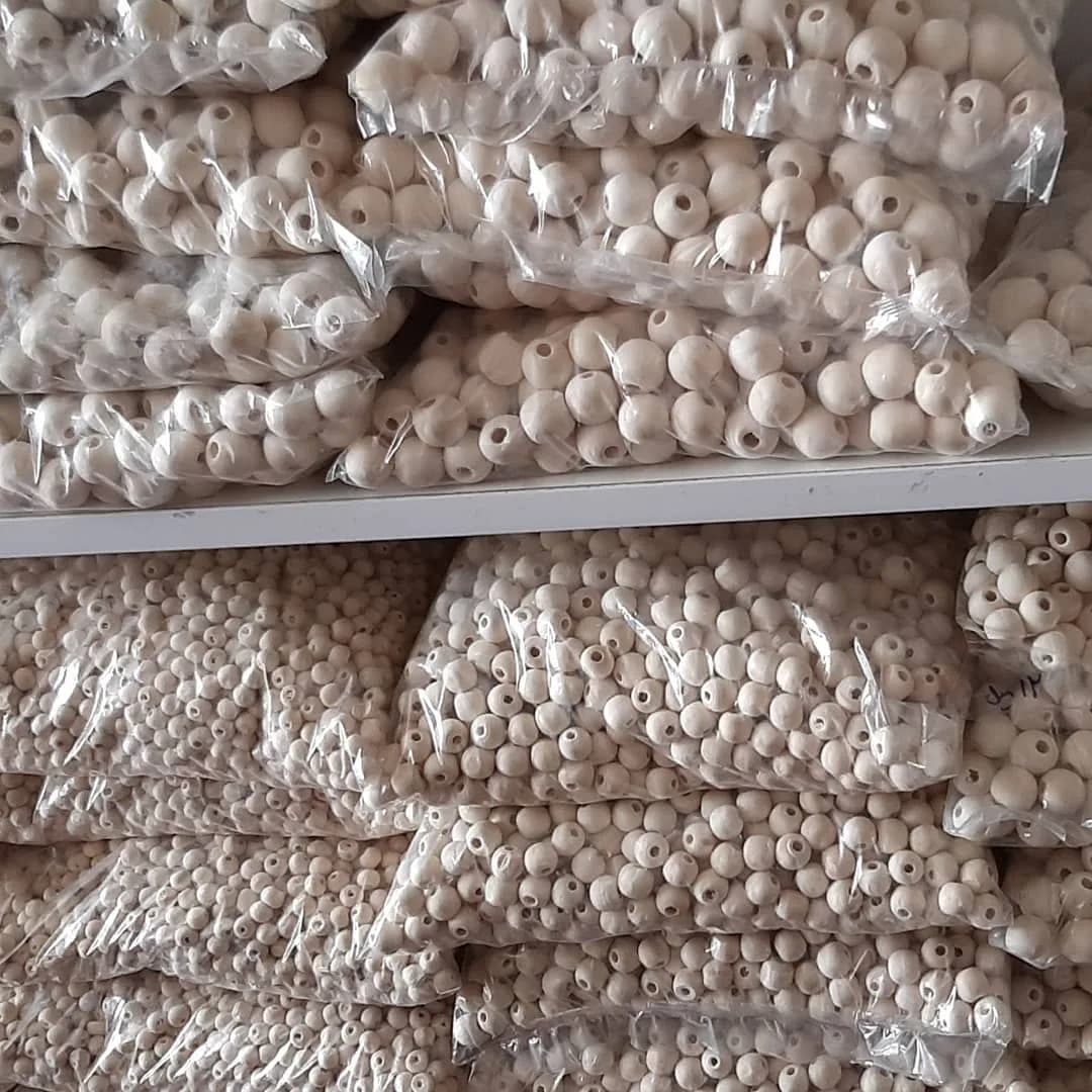 مهره چوبی در ۹ سایز، رنگ کرم، توپک کوچک
