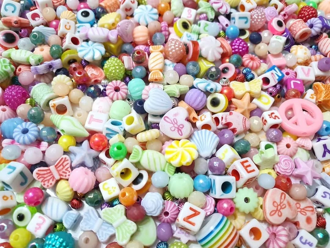 پک مهره رنگی ۱۰۰ گرمی — نمای چندکالا — شامل ۱۰۰ گرم