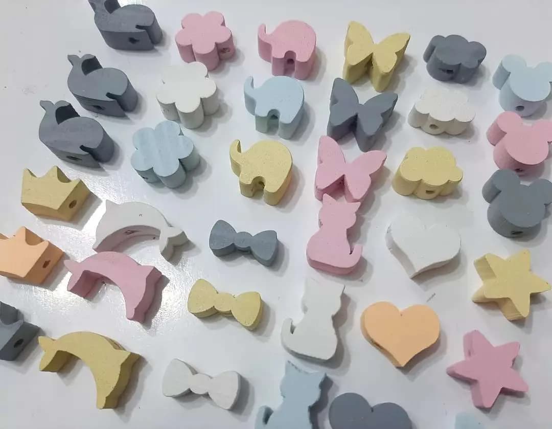 پک ۱۲ عددی مهره چوبی — نمای دردست — پک ۱۰۰ گرمی