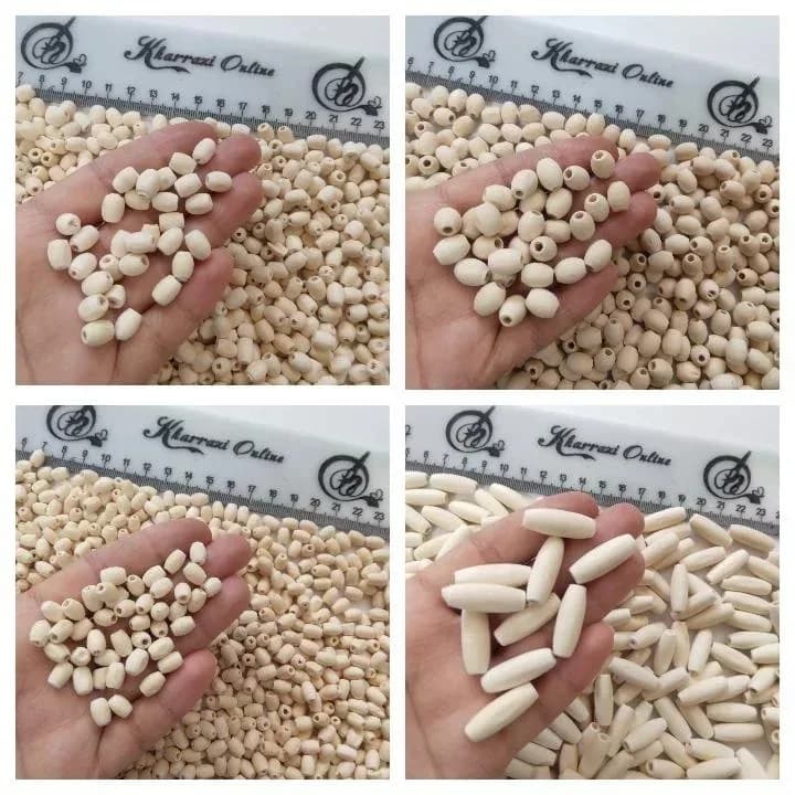 مهره چوبی تسبیح، رنگ کرم، بیضی، استوانهای