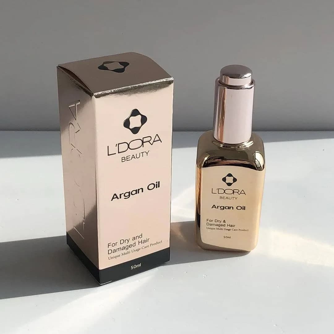 روغن آرگان مو لدورا، رنگ طلایی و سفید، جنس شیشه و پلاستیک، بطری قطرهچکانی