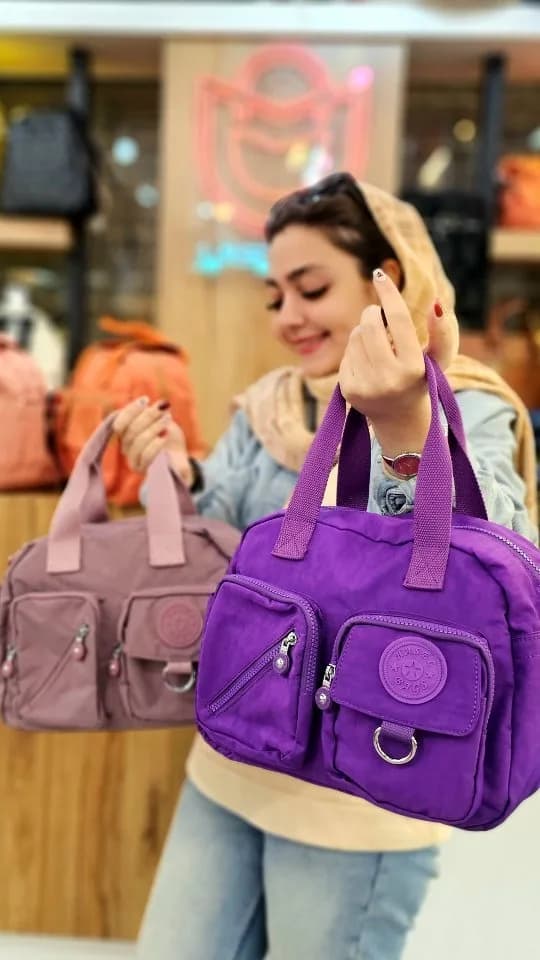 کیف دستی، رنگ بنفش و صورتی، جنس پارچه، متوسط، چند جیبه