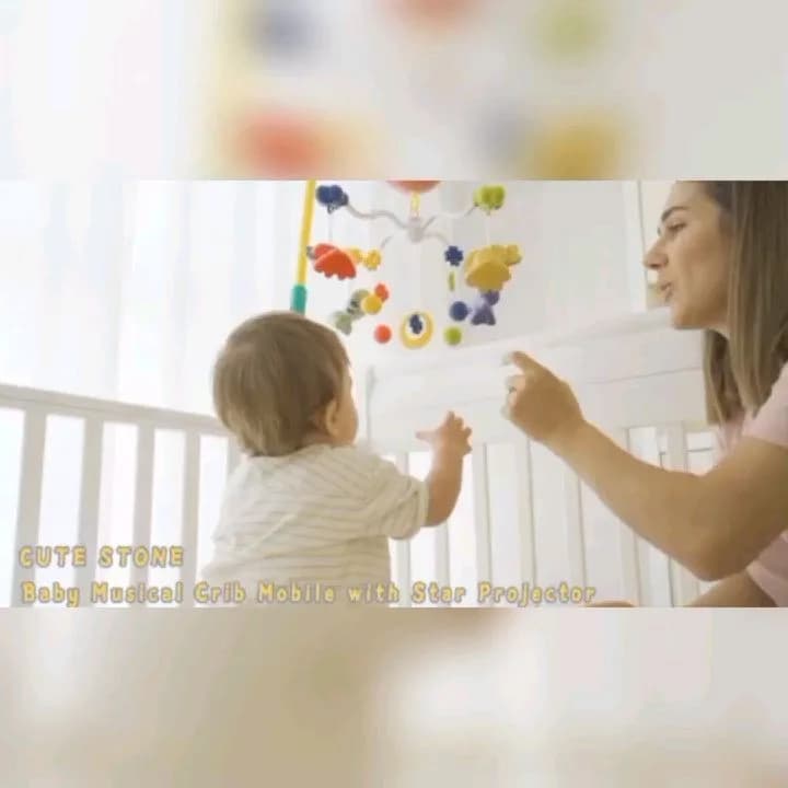 آویز تخت موزیکال و چراغ خواب، رنگ زرد، آبی، قرمز و سفید، جنس پلاستیک، طرح شخصیت کارتونی، مدل بازویی با ریموت