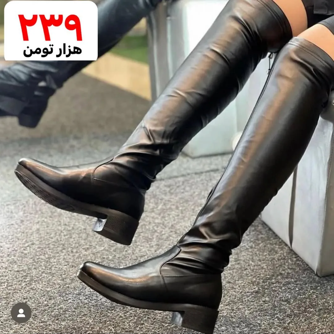 بوت بالای زانو استرج، رنگ مشکی، جنس چرم، ساق‌بلند پاشنه‌کوتاه