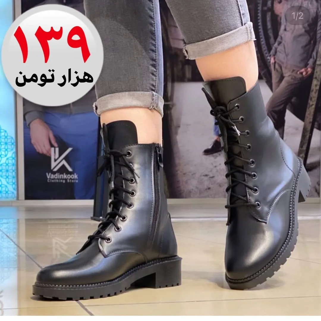 بوت ساده بغل زیپ، رنگ مشکی، جنس چرم، ساق‌بلند بنددار زیپ‌دار