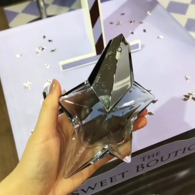 عطر زنانه Angel ادو پرفیوم Mugler، رنگ نقره‌ای و شفاف، جنس شیشه، ستاره‌ای با درپوش