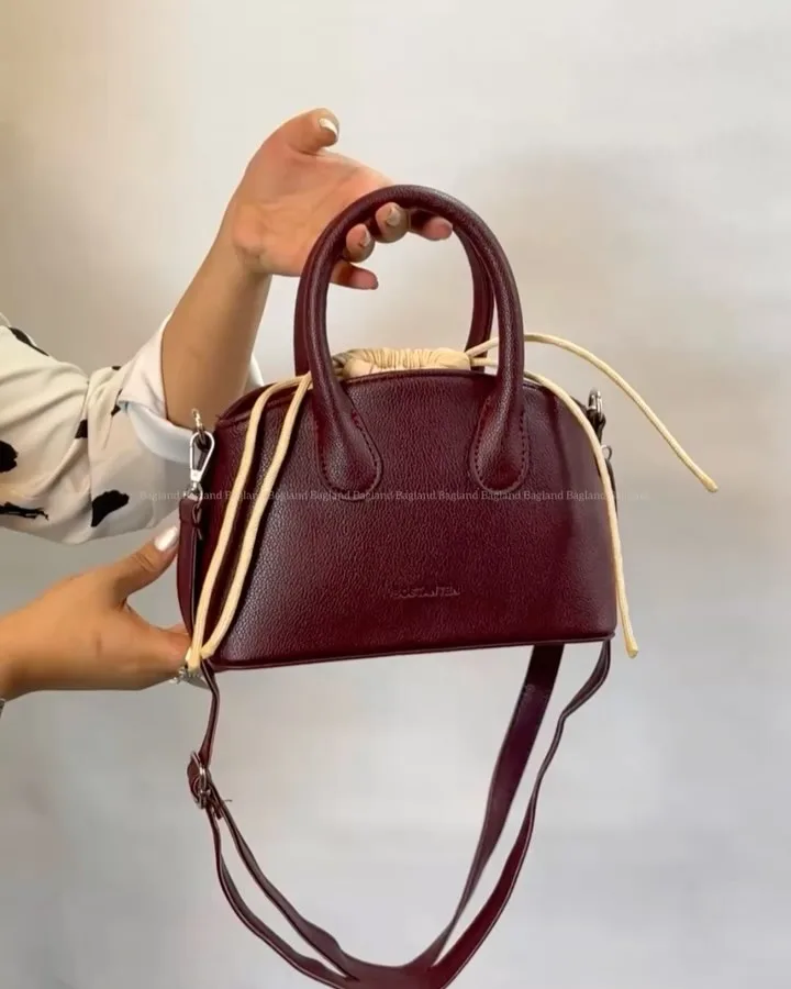 کیف دستی زنانه، رنگ زرشکی، کرم و مشکی، جنس چرم، متوسط