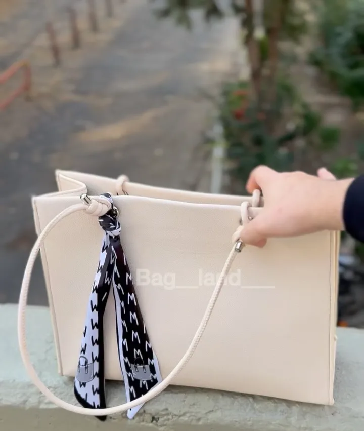 کیف زنانه دیوک، رنگ مشکی، جنس چرم، دستی، مستطیلی