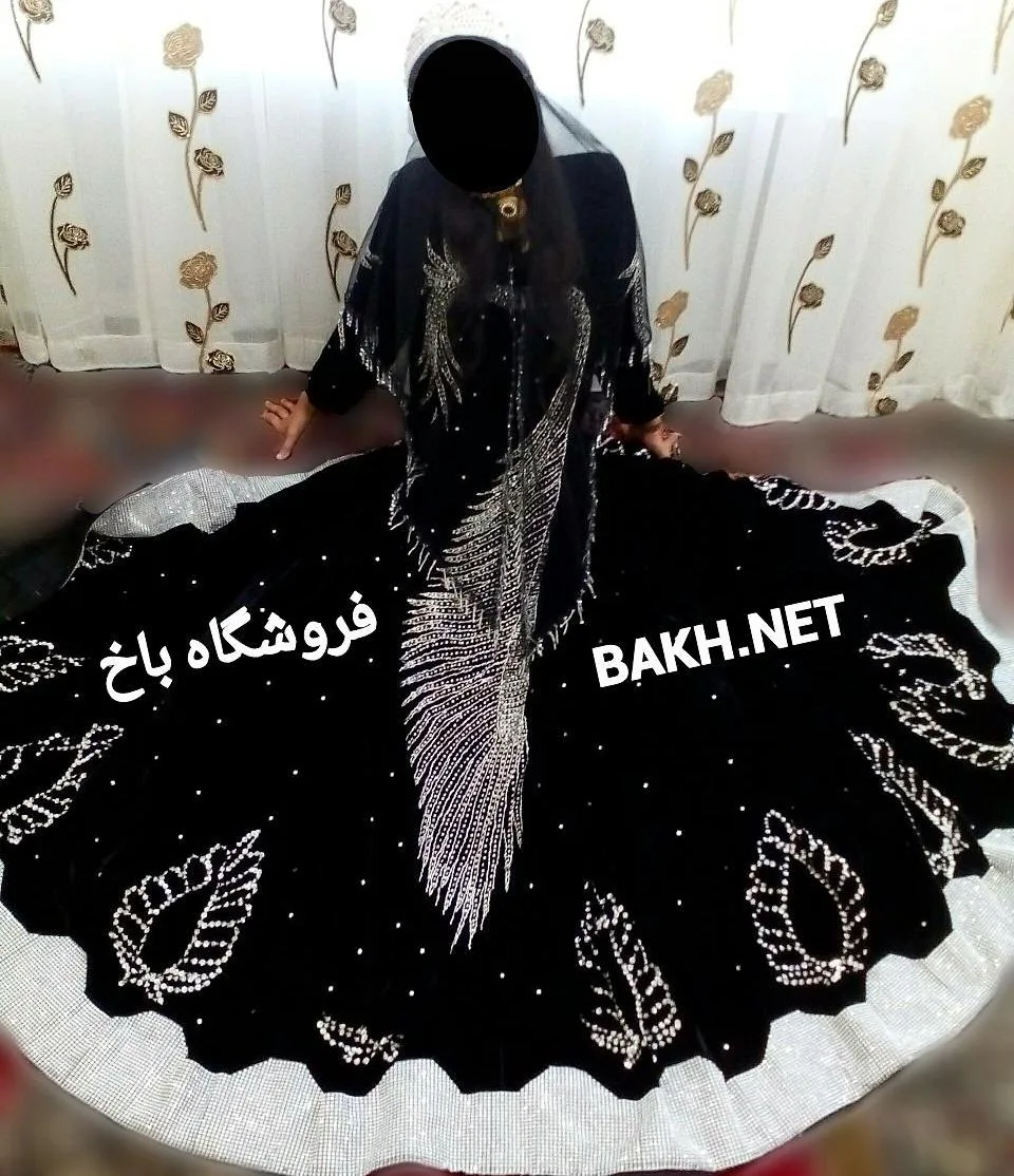 لباس بختیاری مدل ۱۸۶، رنگ مشکی و نقرهای، جنس مخمل، طرح گلدوزی، بلند، آستین بلند، گشاد