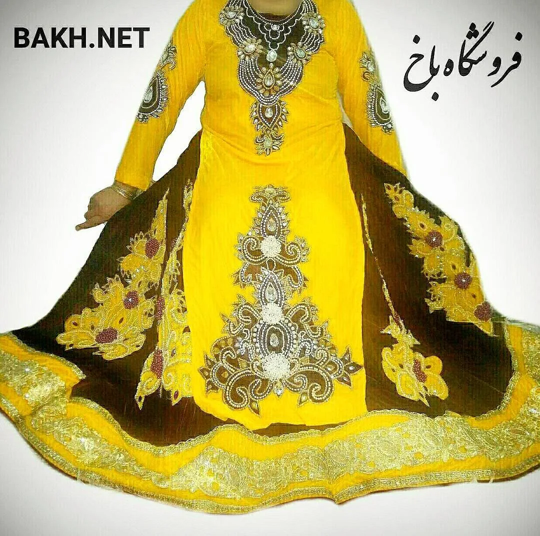 لباس محلی زنانه، رنگ زرد و قهوهای، طرح گلدوزی، بلند، آستین بلند، گشاد