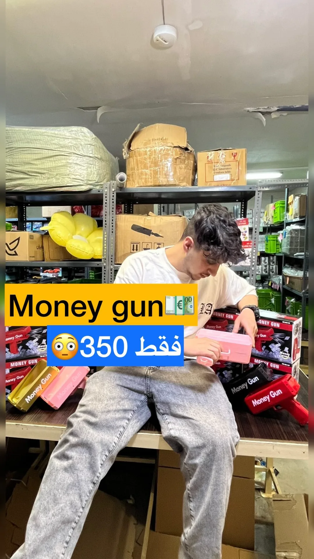 تفنگ پول‌پاش، رنگ صورتی، مشکی و طلایی، جنس پلاستیک و مقوا، تفنگی