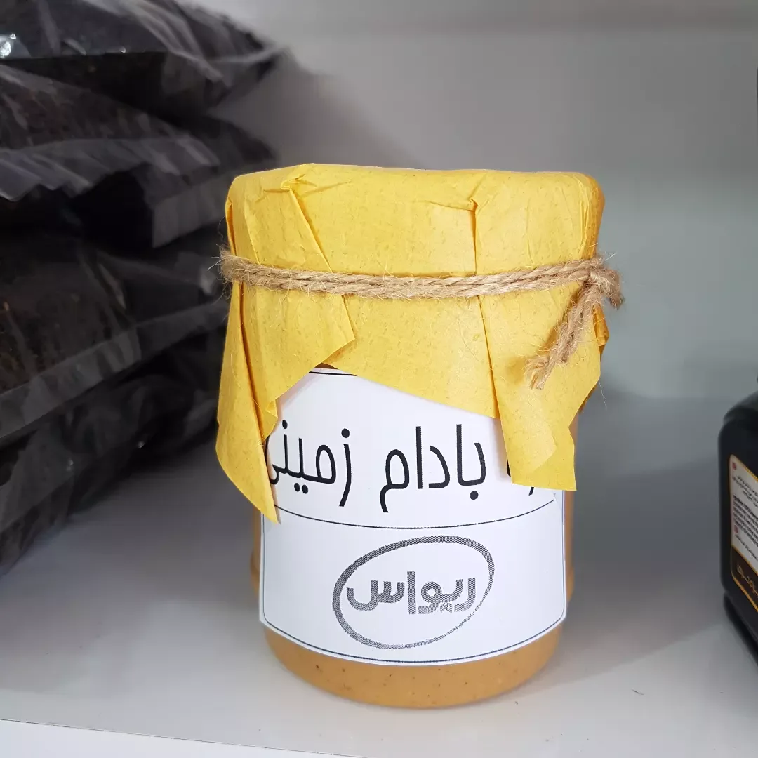 کره بادام زمینی، رنگ قهوهای روشن و زرد، جنس شیشه، خمیر در جار