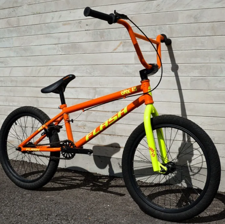 دوچرخه بی ام ایکس مدل BMX13 فلش، رنگ نارنجی، زرد فسفری و مشکی، جنس فلز