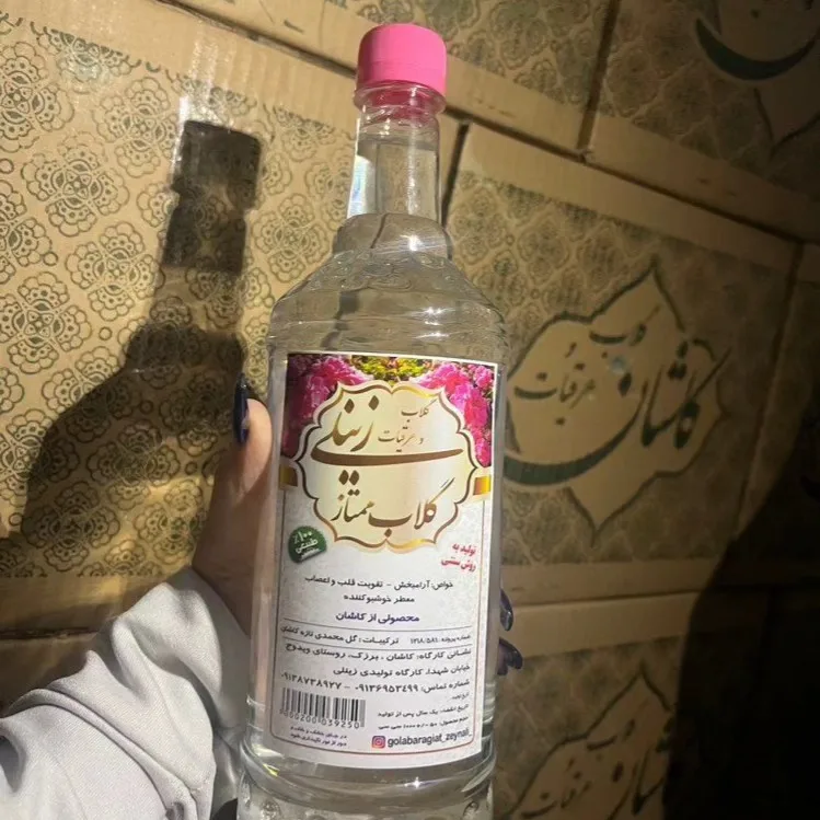 گلاب دوآتیشه زینلی، رنگ شفاف و صورتی، جنس شیشه، بطری شیشه‌ای