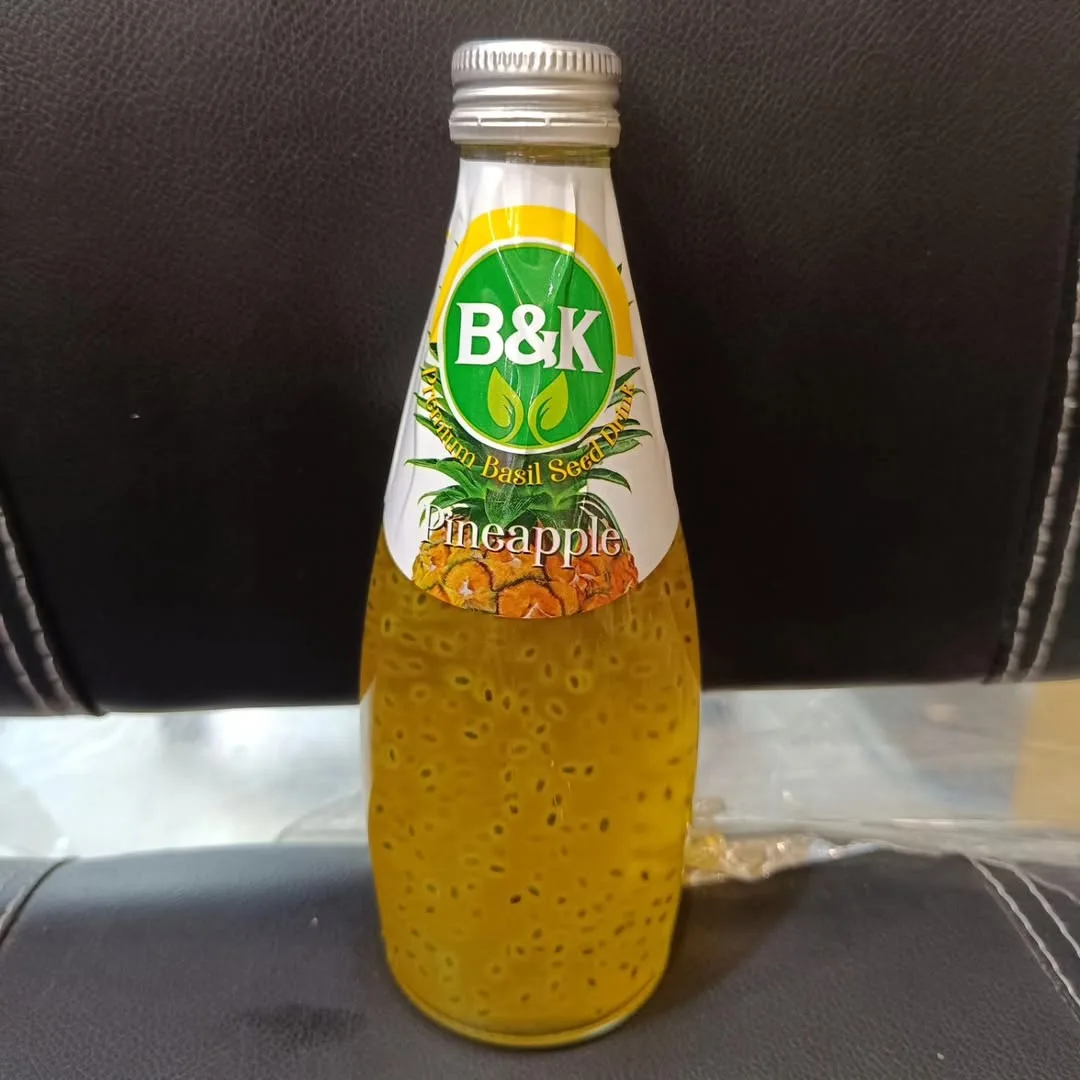 نوشیدنی تخم‌شربتی بی‌وی‌کی، رنگ زرد، سبز و سفید، جنس شیشه، بطری باریک