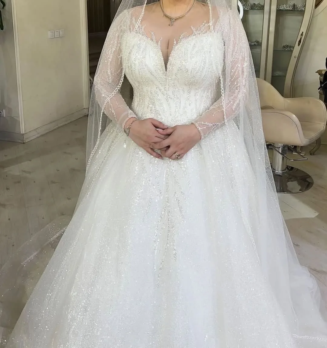 لباس عروس سایز ۴۸ با تور، رنگ سفید، جنس پولک، طرح طرح هندسی، بلند، یقه هفت، آستین بلند