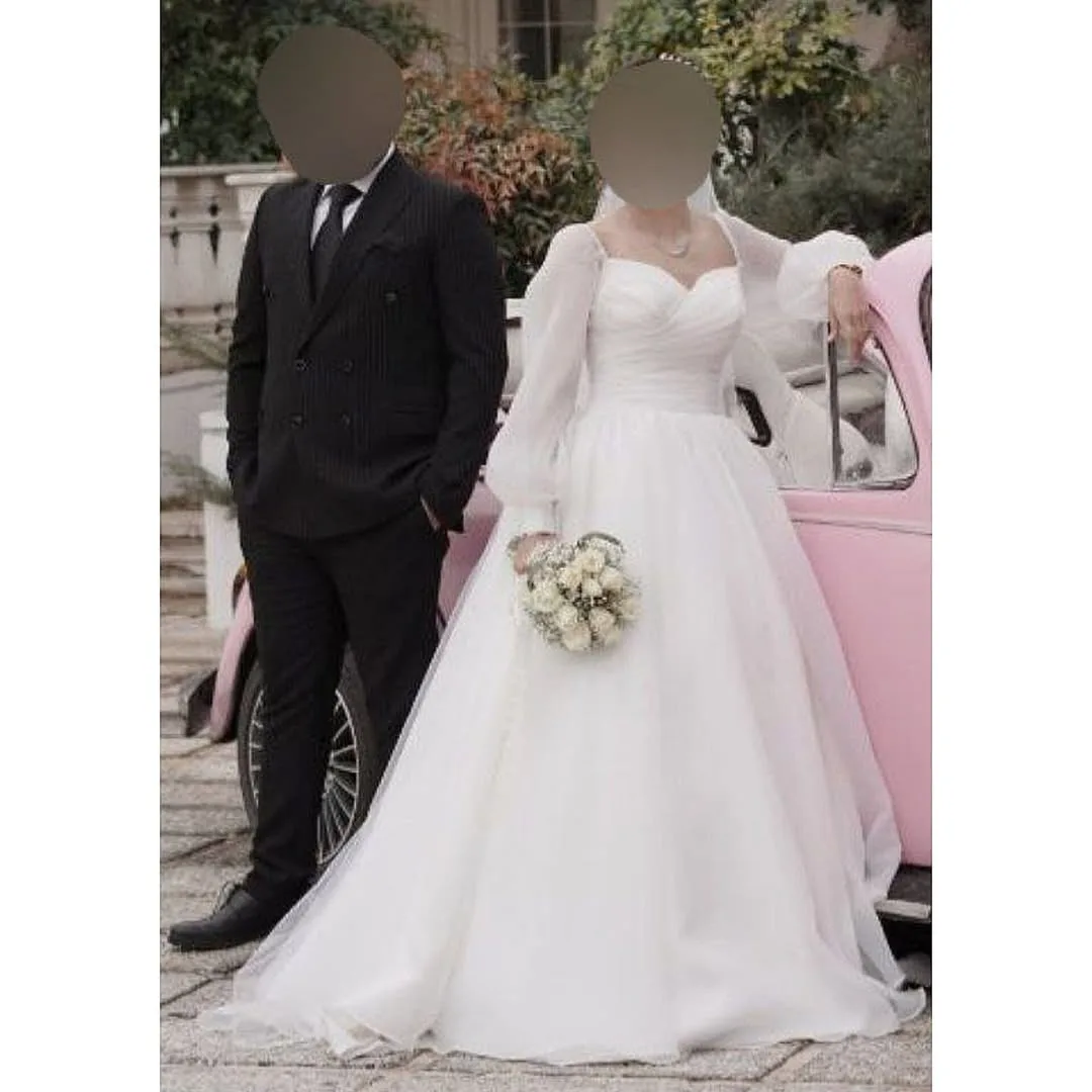 لباس عروس با ژپون و تور سایز ۳۴ تا ۳۶، رنگ سفید و مشکی، جنس پارچه کت و شلواری، بلند، آستیندار