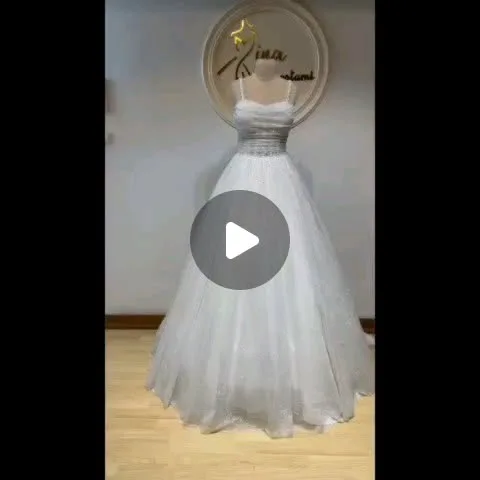 لباس عروس شاین جواهردوزی، رنگ سفید، جنس توری و پولک، طرح گلدوزی، بلند، یقه قلبی، بند نازک، پف‌دار